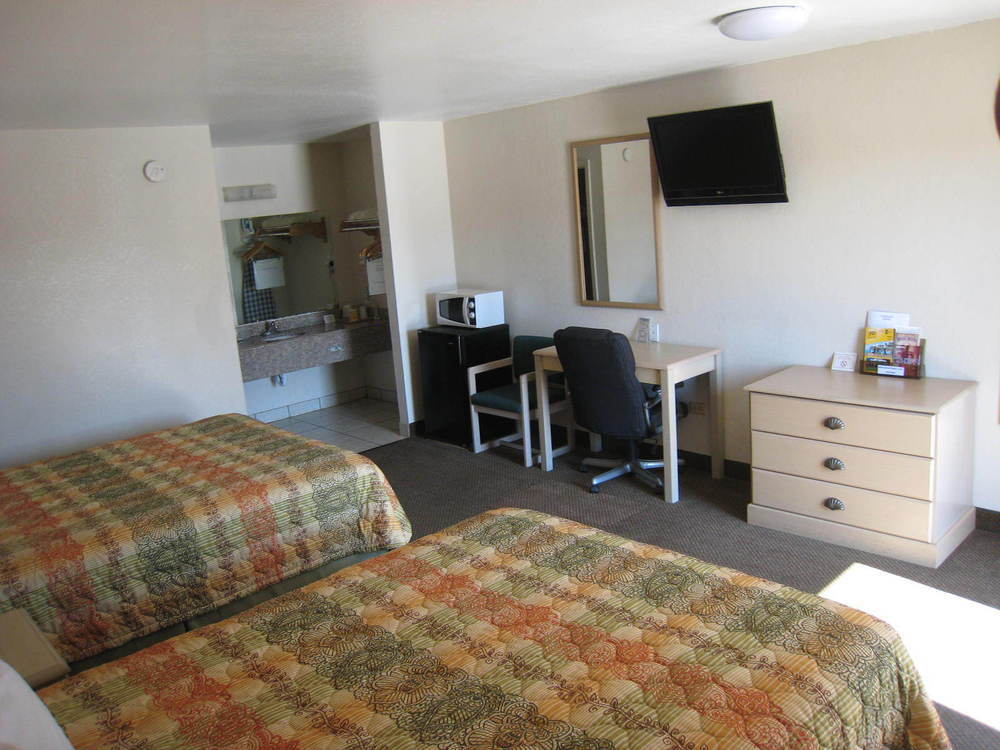 Executive Inn Pearsall Szoba fotó